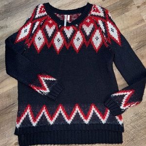 Navy blue, red, and white sweater